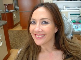 Smiling woman in dental chair