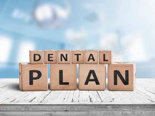 wooden blocks spelling out the words dental plan