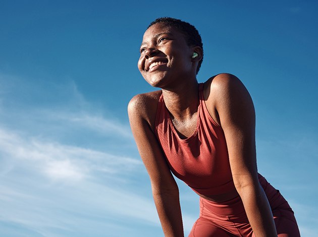 Lady smiles outdoors
