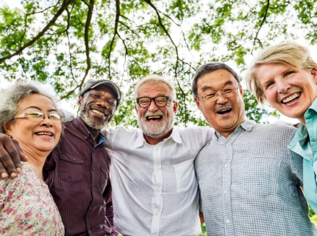 Smiling group of seniors in forest